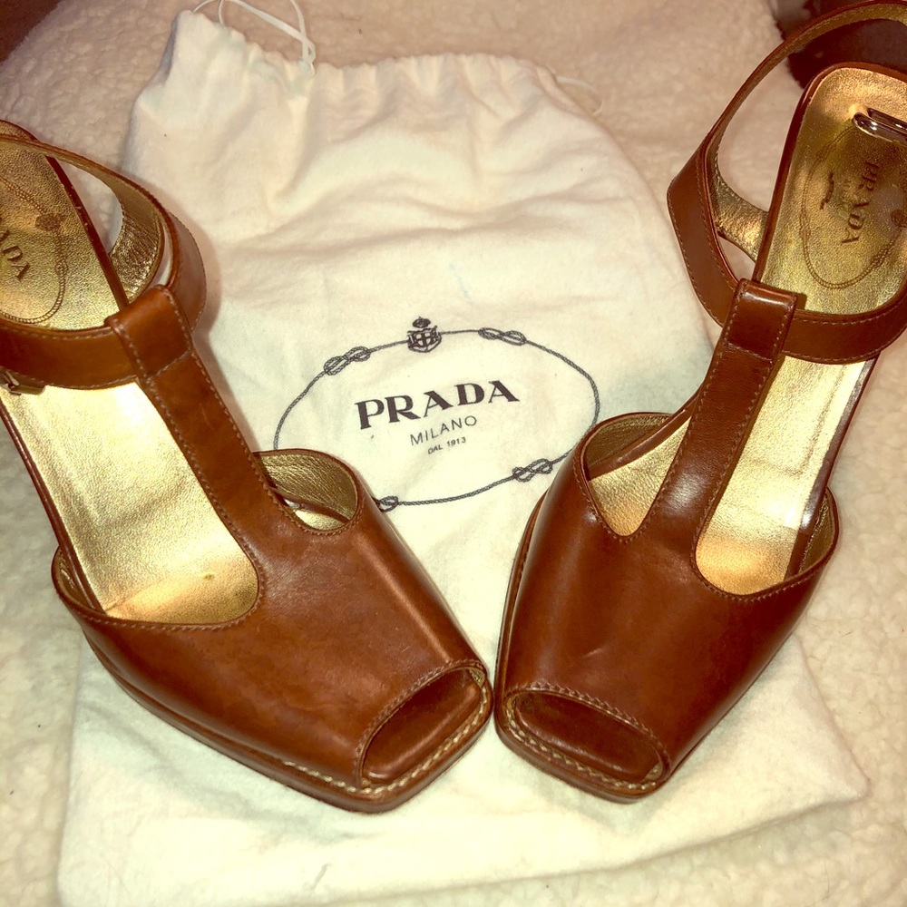 Authenticated Prada heels with dust bag